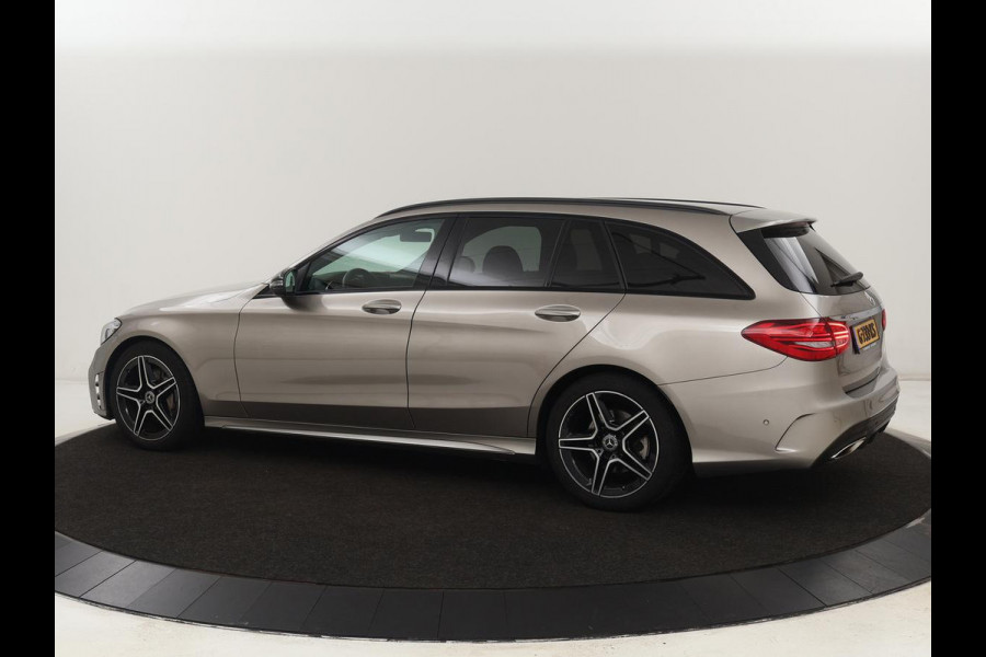 Mercedes-Benz C-Klasse 200 Business Solution AMG | Leder | Carplay | Navigatie | Stoelverwarming | Camera | Adaptive cruise | Full LED | LMV 18 inch