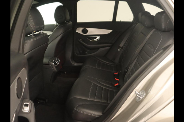 Mercedes-Benz C-Klasse 200 Business Solution AMG | Leder | Carplay | Navigatie | Stoelverwarming | Camera | Adaptive cruise | Full LED | LMV 18 inch