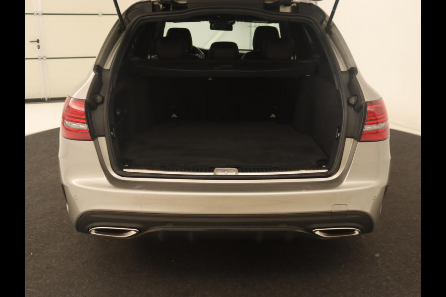 Mercedes-Benz C-Klasse 200 Business Solution AMG | Leder | Carplay | Navigatie | Stoelverwarming | Camera | Adaptive cruise | Full LED | LMV 18 inch