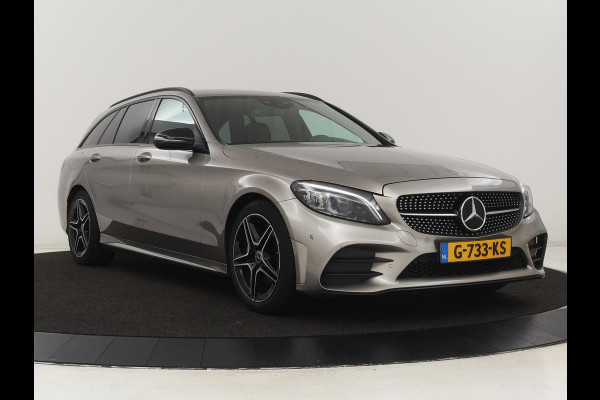 Mercedes-Benz C-Klasse 200 Business Solution AMG | Leder | Carplay | Navigatie | Stoelverwarming | Camera | Adaptive cruise | Full LED | LMV 18 inch
