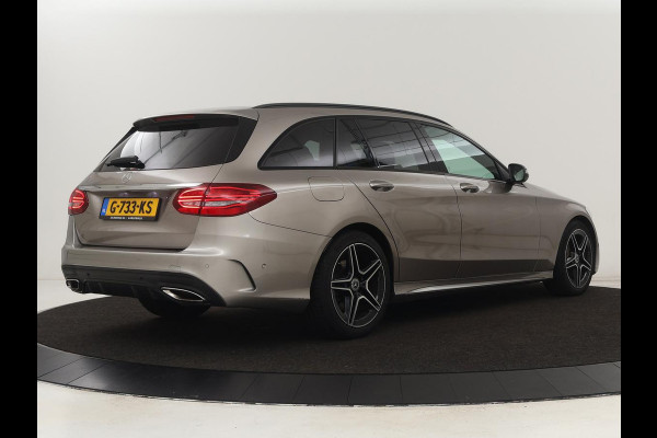 Mercedes-Benz C-Klasse 200 Business Solution AMG | Leder | Carplay | Navigatie | Stoelverwarming | Camera | Adaptive cruise | Full LED | LMV 18 inch