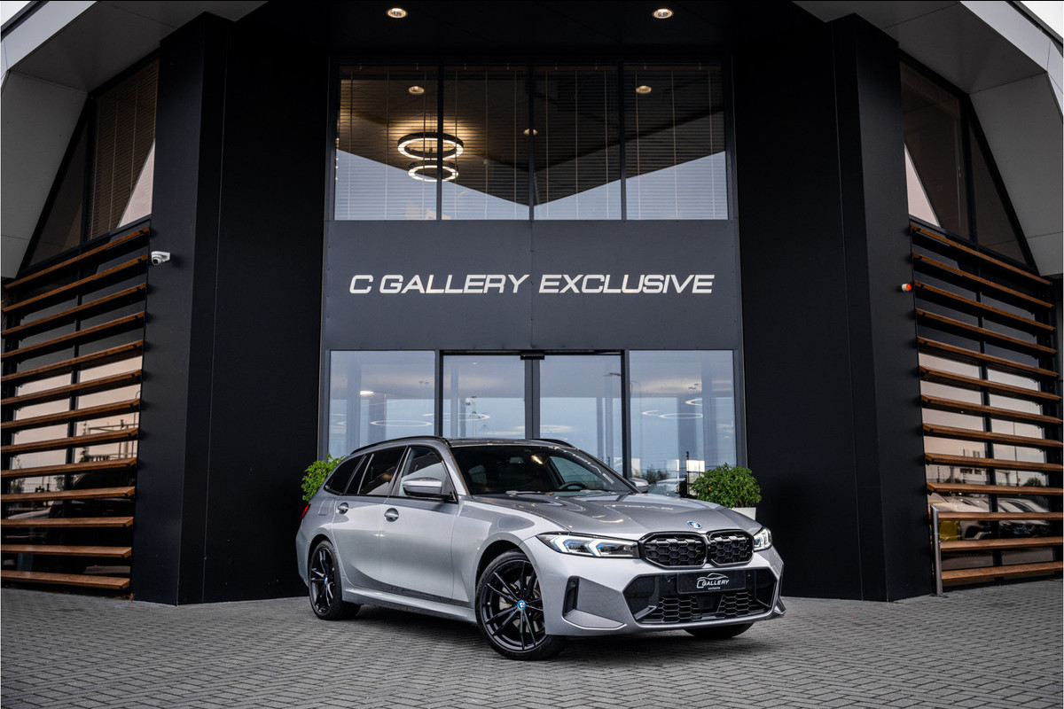 BMW 3 Serie Touring 330e xDrive - Panorama | H&K | Memory | 360 Camera | HUD