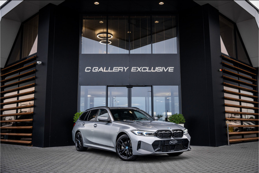 BMW 3 Serie Touring 330e xDrive - Panorama | H&K | Memory | 360 Camera | HUD