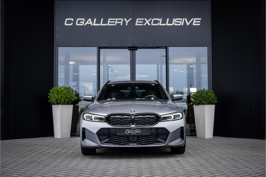 BMW 3 Serie Touring 330e xDrive - Panorama | H&K | Memory | 360 Camera | HUD