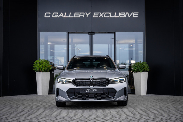 BMW 3 Serie Touring 330e xDrive - Panorama | H&K | Memory | 360 Camera | HUD