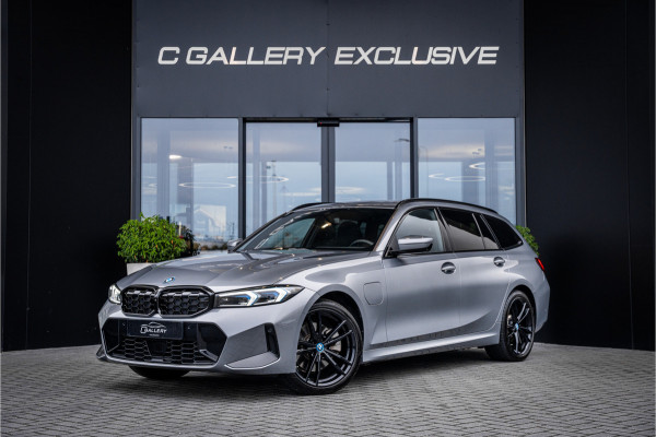 BMW 3 Serie Touring 330e xDrive - Panorama | H&K | Memory | 360 Camera | HUD