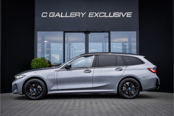BMW 3 Serie Touring 330e xDrive - Panorama | H&K | Memory | 360 Camera | HUD