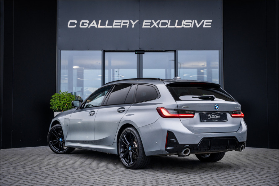 BMW 3 Serie Touring 330e xDrive - Panorama | H&K | Memory | 360 Camera | HUD