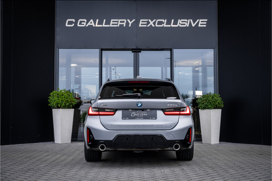 BMW 3 Serie Touring 330e xDrive - Panorama | H&K | Memory | 360 Camera | HUD