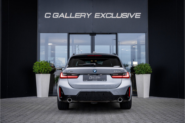 BMW 3 Serie Touring 330e xDrive - Panorama | H&K | Memory | 360 Camera | HUD