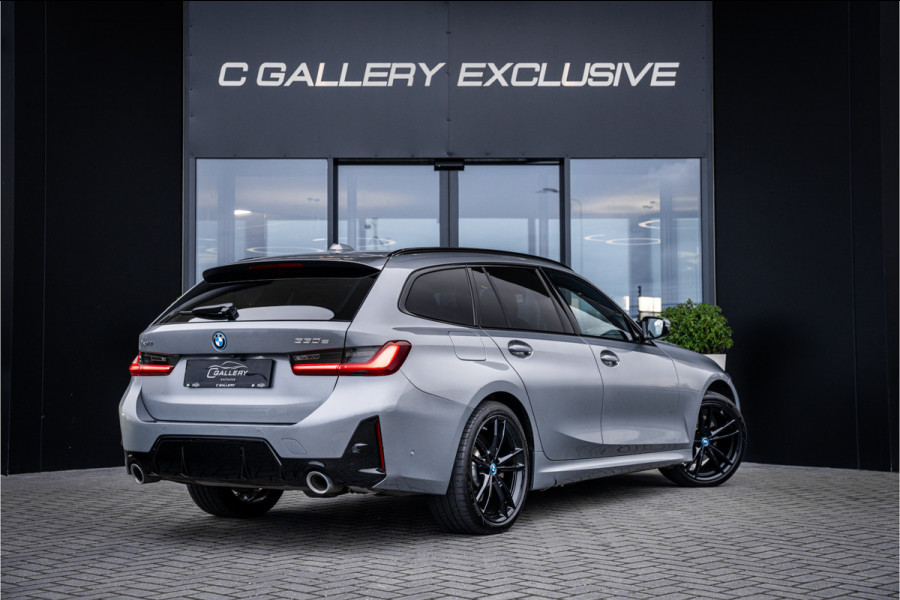BMW 3 Serie Touring 330e xDrive - Panorama | H&K | Memory | 360 Camera | HUD