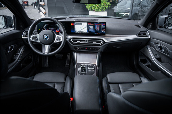 BMW 3 Serie Touring 330e xDrive - Panorama | H&K | Memory | 360 Camera | HUD