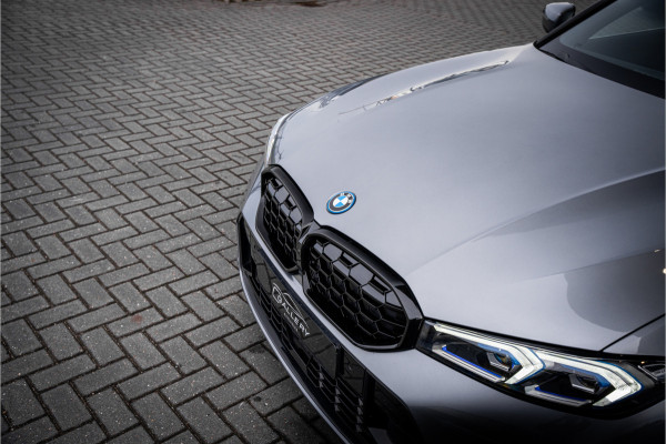 BMW 3 Serie Touring 330e xDrive - Panorama | H&K | Memory | 360 Camera | HUD