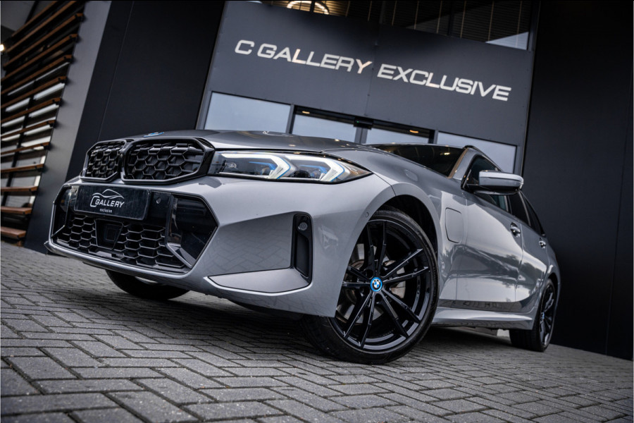 BMW 3 Serie Touring 330e xDrive - Panorama | H&K | Memory | 360 Camera | HUD