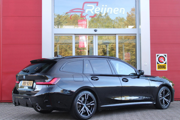 BMW 3 Serie Touring 320e 205PK M-SPORT | PANORAMISCH SCHUIF/KANTEL DAK | M-SPORT PAKKET INTERIEUR/EXTERIEUR | SFEER VERLICHTING | ELEKTRISCH BEDIENBARE VOORSTOELEN MET GEHEUGEN OP DE BESTUURDERSSTOEL | STOEL VERWARMING | HEAD UP DISPLAY | CRUISE CONTROL | NAVIGATIE | DRAADLOZE APPLE CARPLAY/ANDROID AUTO | DRAADLOZE TELEFOONLADER | 18" LICHTMETALEN VELGEN M-SPORT | 360° CAMERA | BMW LIVE DASHBOARD PROFESSIONAL | COMFORT ACCESS | SHADOW LINE PAKKET | FULL LED KOPLAMPEN | NAVIGATIE | CLIMATE CONTROL ACHTERIN |