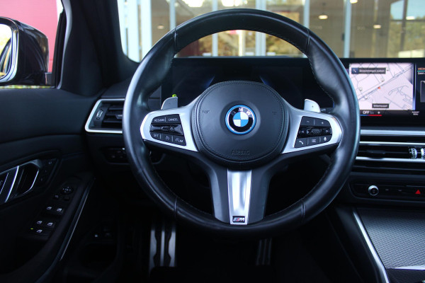 BMW 3 Serie Touring 320e 205PK M-SPORT | PANORAMISCH SCHUIF/KANTEL DAK | M-SPORT PAKKET INTERIEUR/EXTERIEUR | SFEER VERLICHTING | ELEKTRISCH BEDIENBARE VOORSTOELEN MET GEHEUGEN OP DE BESTUURDERSSTOEL | STOEL VERWARMING | HEAD UP DISPLAY | CRUISE CONTROL | NAVIGATIE | DRAADLOZE APPLE CARPLAY/ANDROID AUTO | DRAADLOZE TELEFOONLADER | 18" LICHTMETALEN VELGEN M-SPORT | 360° CAMERA | BMW LIVE DASHBOARD PROFESSIONAL | COMFORT ACCESS | SHADOW LINE PAKKET | FULL LED KOPLAMPEN | NAVIGATIE | CLIMATE CONTROL ACHTERIN |