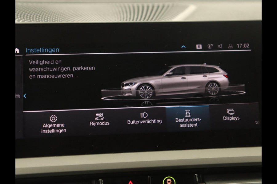 BMW 3 Serie Touring 330e | Keyless | Full LED | Carplay | Navigatie | Leder | Stoelverwarming | Camera | LMV 17 inch | Cruise control | Getint glas