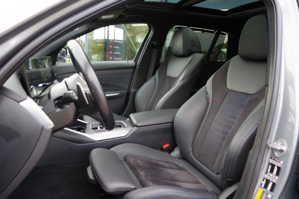 BMW 3 Serie Touring 320e M-Sport 204 PK PHEV, Panoramadak, Camera, Memory, Head-Up