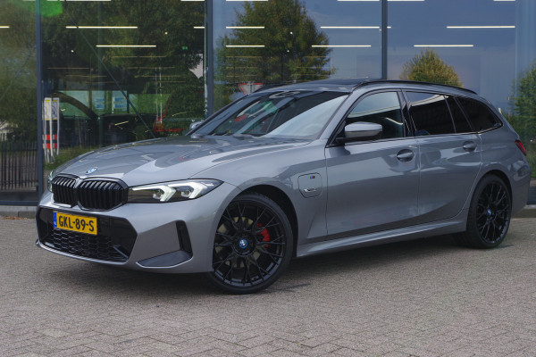 BMW 3 Serie Touring 320e M-Sport 204 PK PHEV, Panoramadak, Camera, Memory, Head-Up