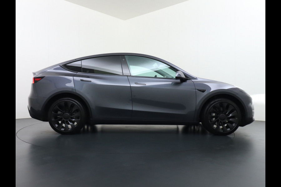 Tesla Model Y Long Range AWD 75kWh  Trekhaak Lmv 20" Wrmtepomp Leder Navi Ecc Premium Audio Stoel+Stuurverwarming Autopilot 3.0 Adaptieve Crui Memory Matrix Led Intel Atom® Processor Homelink 5 Achterbank verwarmd 4WD 1.600KG Trekgewicht