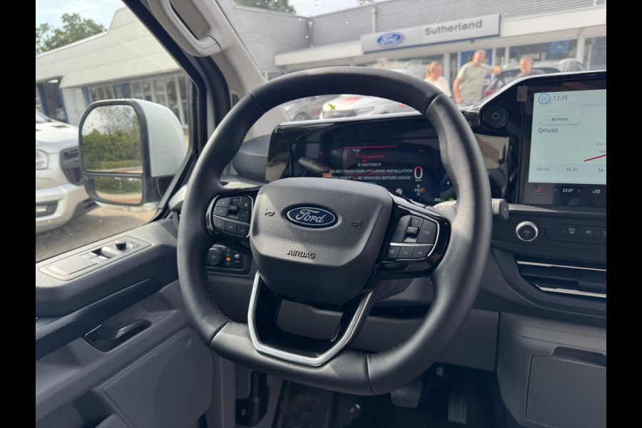 Ford E-Transit Custom 320 L1 Limited/Titanium Elektrisch | SCI | Ford Voorraad |  65kWh 218pk | Frozen White | Dubbele zijschuifdeur | Ruit in laadschot | Ruit in rechter zijschuifdeur| Verwarmbare passagiersstoel (8-weg verstelbaar) | Inklapbare trekhaak | Centrale dubbele vergrendeling | Driver Assistance Pack Premium | AGM accu | BEV 3-fase oplaadkabel 10 meter