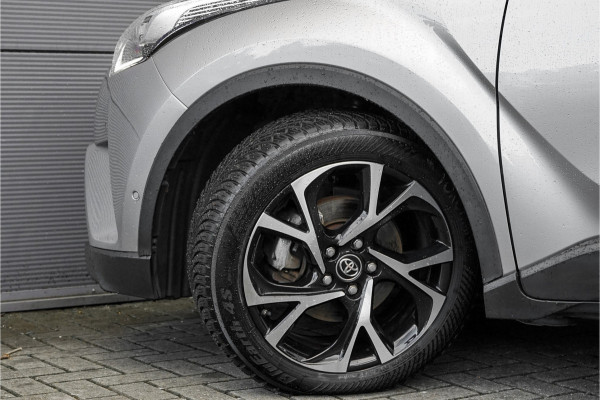 Toyota C-HR 1.8 Hybrid Bi-Tone Leder Camera Navi 1e Eig Dealeronderhouden