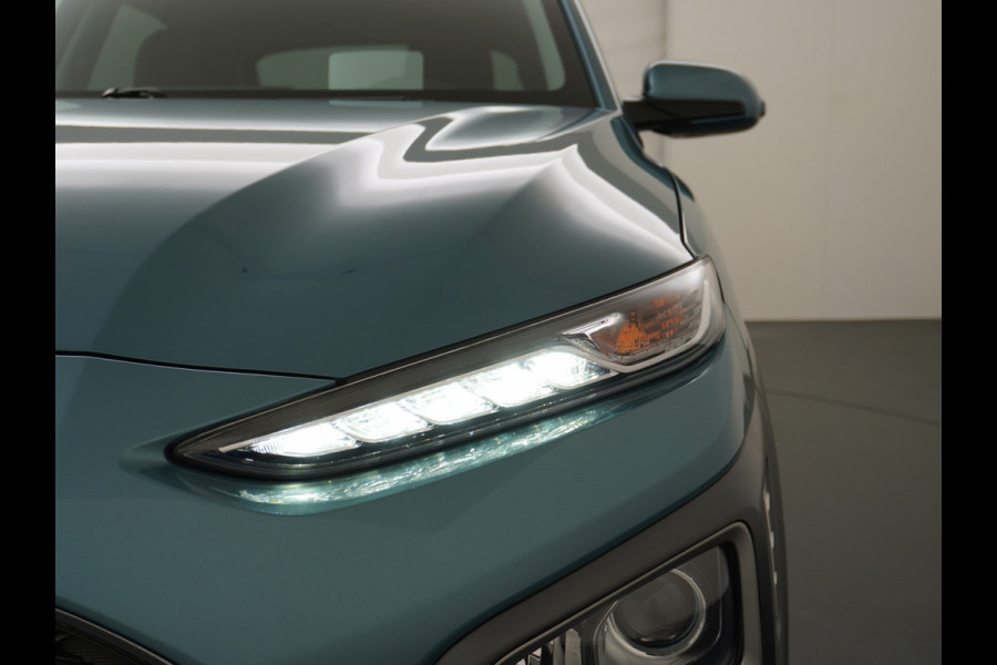 Hyundai Kona 1.6GDI HEV Hybride Trekhaak Camera Adap.Cruise Head-Up Display Navi Ecc Fashion Keyless Apple Carplay/Android Auto Privacy Glas 1e Eigenaar 1.300KG Trekgewicht Origineel Nederlandse Auto
