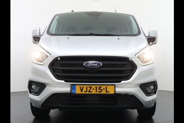 Ford Transit Custom 300 2.0TDCI 130PK AUTOMAAT L2H1 3-Persoons Trekhaak Camera Cruise Control DAB Pdc Trend Schuifdeur Betonplex vloer Lat om Lat Wandbetimmering 1.750KG Trekgewicht Euro 6