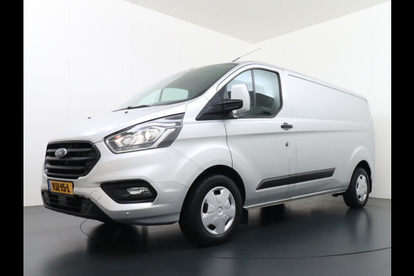 Ford Transit Custom 300 2.0TDCI 130PK AUTOMAAT L2H1 3-Persoons Trekhaak Camera Cruise Control DAB Pdc Trend Schuifdeur Betonplex vloer Lat om Lat Wandbetimmering 1.750KG Trekgewicht Euro 6