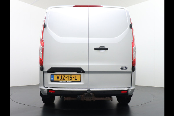 Ford Transit Custom 300 2.0TDCI 130PK AUTOMAAT L2H1 3-Persoons Trekhaak Camera Cruise Control DAB Pdc Trend Schuifdeur Betonplex vloer Lat om Lat Wandbetimmering 1.750KG Trekgewicht Euro 6