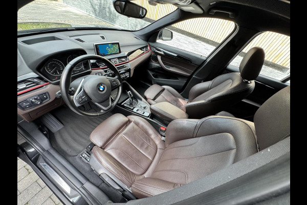 BMW X1 sDrive20i High Executive Automaat | Lederen bekleding | Stoelverwarming | Navigatiesysteem | Cruise control | Climate control |