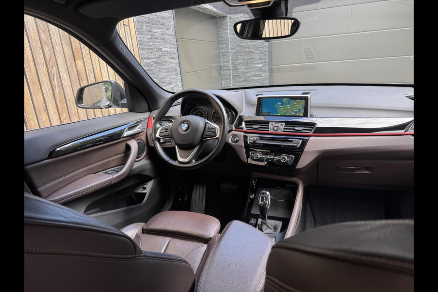 BMW X1 sDrive20i High Executive Automaat | Lederen bekleding | Stoelverwarming | Navigatiesysteem | Cruise control | Climate control |