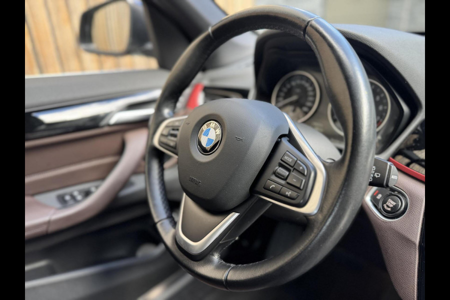 BMW X1 sDrive20i High Executive Automaat | Lederen bekleding | Stoelverwarming | Navigatiesysteem | Cruise control | Climate control |