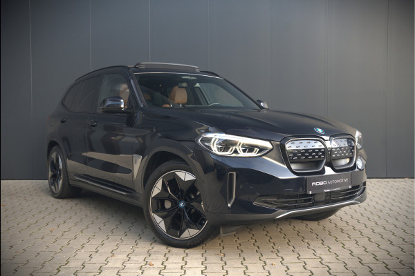 BMW iX3 High Executive 80 kWh | Panoramadak | Keyless | Stoelverwarming | Harman Kardon | Memory Seat | Head-Up Display | 360 Camera | Adaptief Onderstel | Trekhaak | Adaptive LED | Elektrische Stoelen | Apple Carplay | N