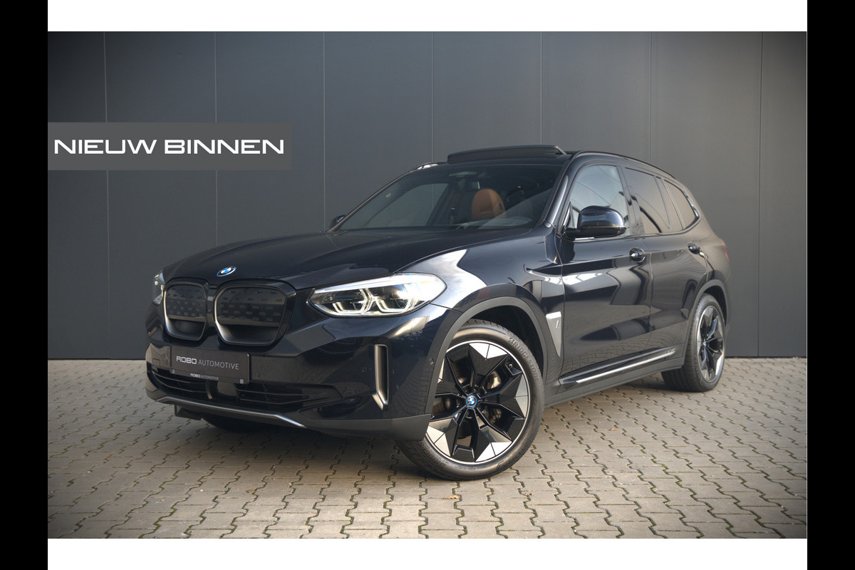 BMW iX3 High Executive 80 kWh | Panoramadak | Keyless | Stoelverwarming | Harman Kardon | Memory Seat | Head-Up Display | 360 Camera | Adaptief Onderstel | Trekhaak | Adaptive LED | Elektrische Stoelen | Apple Carplay | N
