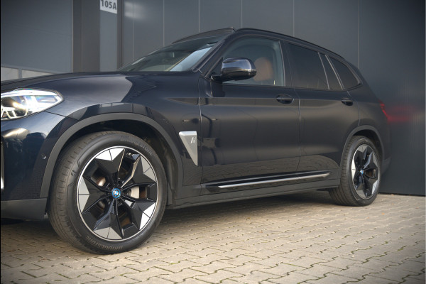 BMW iX3 High Executive 80 kWh | Panoramadak | Keyless | Stoelverwarming | Harman Kardon | Memory Seat | Head-Up Display | 360 Camera | Adaptief Onderstel | Trekhaak | Adaptive LED | Elektrische Stoelen | Apple Carplay | N