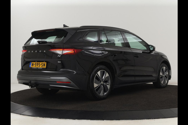 Škoda ENYAQ iV 60 | Stoelverwarming | Trekhaak | Matrix LED | Carplay | Stuurverwarming | Navigatie | Half leder | Cruise control | Parkeerhulp
