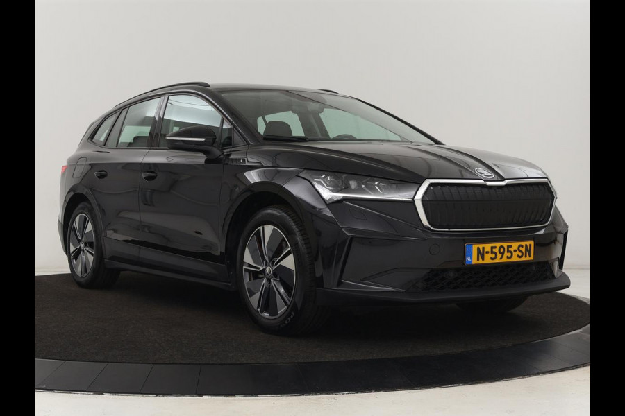 Škoda ENYAQ iV 60 | Stoelverwarming | Trekhaak | Matrix LED | Carplay | Stuurverwarming | Navigatie | Half leder | Cruise control | Parkeerhulp