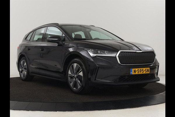 Škoda ENYAQ iV 60 | Stoelverwarming | Trekhaak | Matrix LED | Carplay | Stuurverwarming | Navigatie | Half leder | Cruise control | Parkeerhulp
