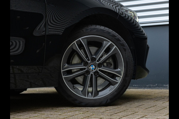 BMW 1-serie 118i Sportline - Adaptive Cruise - Camera - Head-Up - Hifi - LED