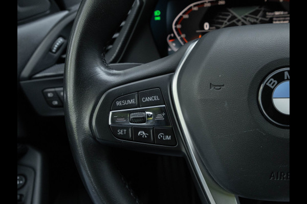 BMW 1-serie 118i Sportline - Adaptive Cruise - Camera - Head-Up - Hifi - LED