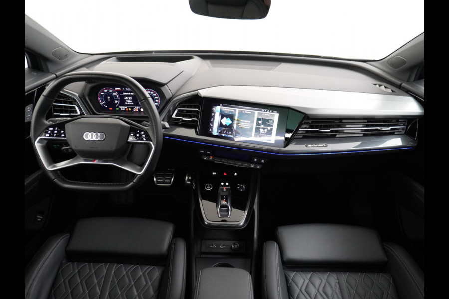 Audi Q4 e-tron 50 Quattro 300pk S-Line Competition Pano-dak Leer Matrix-Led 21" 77kWh Sonos®-Audio Warmtepomp Adaptive-CruiseHead-Up-Display La Assistentie Pack Comfort-plus Pack Dynamic Pack Interieur Pack Keyless Pack Automatisch grootlicht Privacy-Glass Zeer compleet Grote Accu €75.000 nieuw
