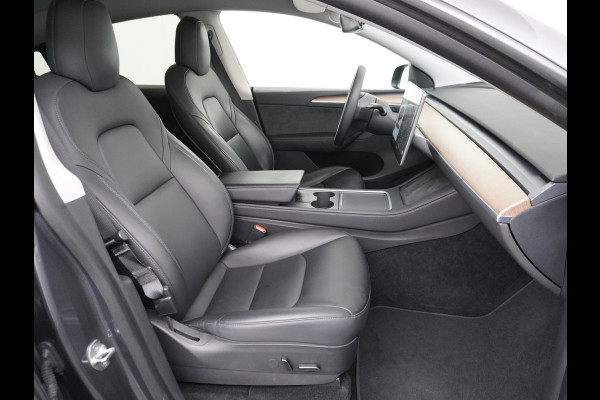 Tesla Model Y Long Range AWD 75kWh  Trekhaak Lmv 20" Wrmtepomp Leder Navi Ecc Premium Audio Stoel+Stuurverwarming Autopilot 3.0 Adaptieve Crui Memory Matrix Led Intel Atom® Processor Homelink 5 Achterbank verwarmd 4WD 1.600KG Trekgewicht