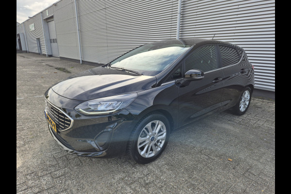 Ford Fiesta 1.0 EcoBoost Hybrid Titanium,Android/Carplay/navigatie,airco.cruise,stoel/stuur/voorruit verwarming,parkeesensoren,