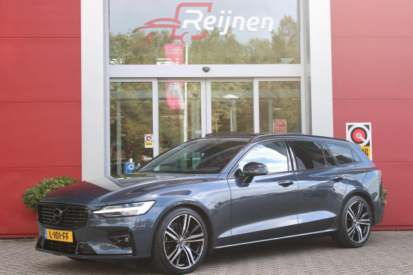 Volvo V60 2.0 B3 R-DESIGN 177PK MILD HYBRID GEARTRONIC 8 | PANORAMISCH SCHUIF/KANTELDAK | PREMIUM AUDIO BY HARMAN KARDON | 19" 5-TRIPPLE SPAAKS BLACK/DIAMAND CUT LICHTMETALEN VELGEN | BLINDSPOT INFOMATION SYSTEM (BLIS) | VERWARMDE VOORRUIT |VERWARMDE AQUABLADE RUITENWISSERBLADEN | PILOT ASSIST | APPLE CARPLAY / ANDROID AUTO | DODEHOEKDETECTIE |  ADAPTIEVE CRUISECONTROL | R-DESIGN BEKLEDING MET NAPPA LEDER I.C.M. OPEN GRID TEXTIEL | ELEKTRISCH VERSTELBARE CONTOUR STOELEN (SPORTSTOELEN) MET GEHEUGEN OP BEIDE VOORSTOELEN |VERWARMDE VOORSTOELEN EN ACHTERBANK | VERWARMD STUURWIEL | P