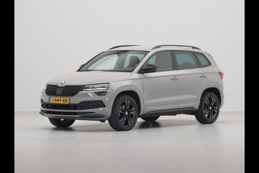 Škoda Karoq 1.5 TSI ACT 150pk DSG Sportline Business Navigatie CantonSound Stoelverwarming Camera Carplay Sideassist