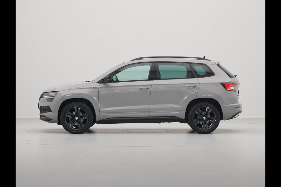 Škoda Karoq 1.5 TSI ACT 150pk DSG Sportline Business Navigatie CantonSound Stoelverwarming Camera Carplay Sideassist
