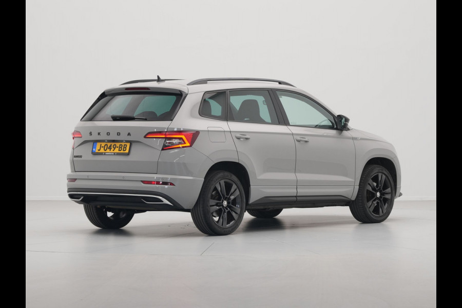 Škoda Karoq 1.5 TSI ACT 150pk DSG Sportline Business Navigatie CantonSound Stoelverwarming Camera Carplay Sideassist