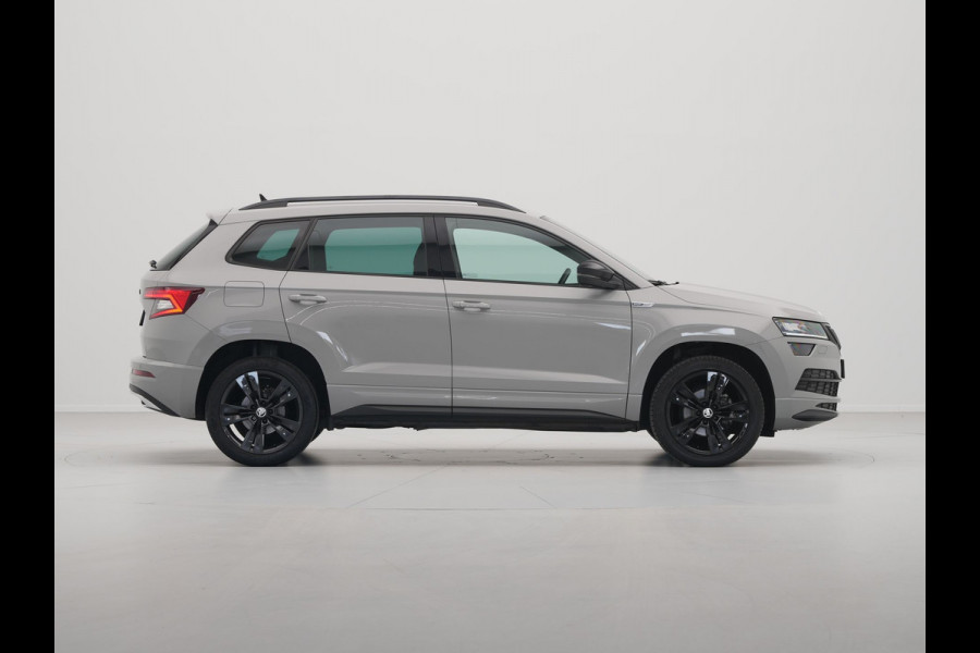 Škoda Karoq 1.5 TSI ACT 150pk DSG Sportline Business Navigatie CantonSound Stoelverwarming Camera Carplay Sideassist