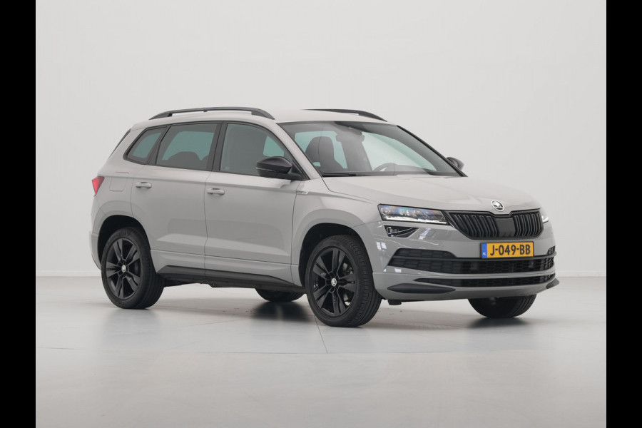 Škoda Karoq 1.5 TSI ACT 150pk DSG Sportline Business Navigatie CantonSound Stoelverwarming Camera Carplay Sideassist